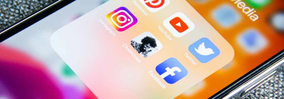 iPhone with social media icons