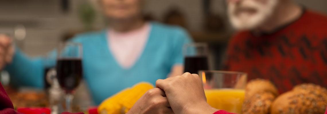 Elderly people around dinning table