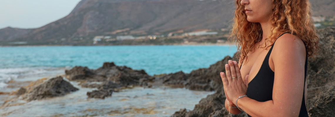 woman meditation by the ocean